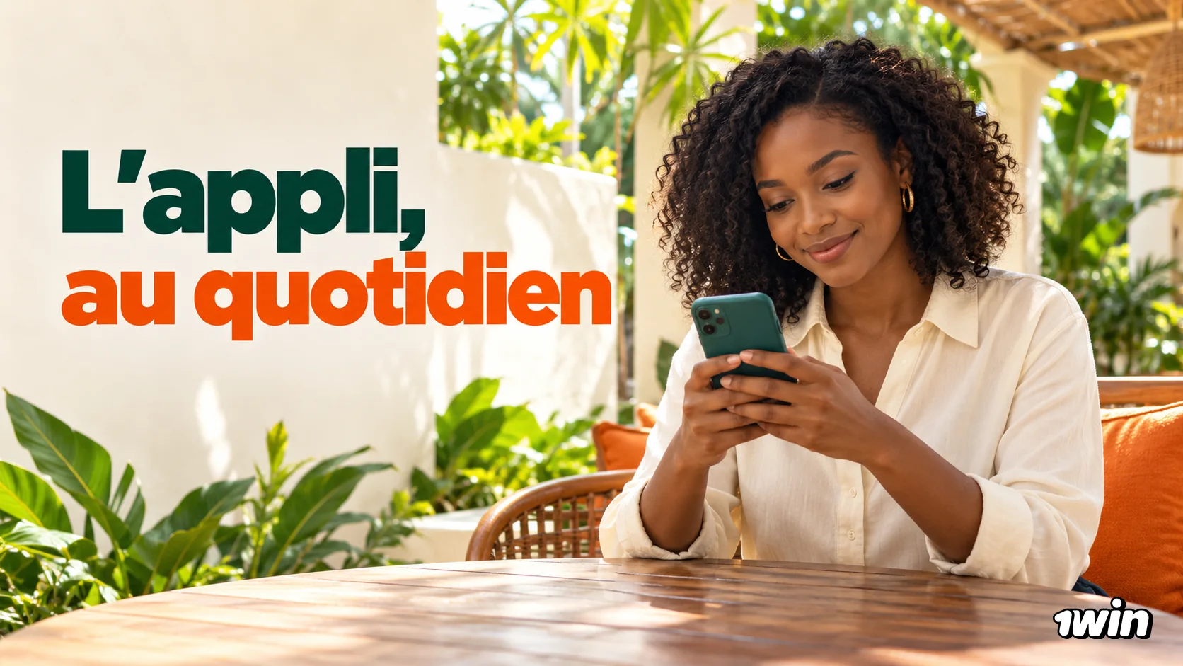 Femme consultant une application sur son téléphone à une terrasse.